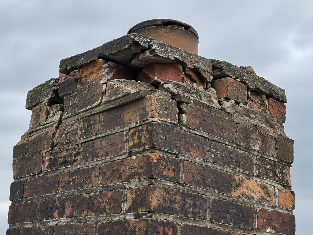 Crown rebuild & repointing — before